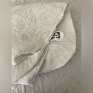 Sealy Total Stain Protection Waterproof Crib Mattress Pad.